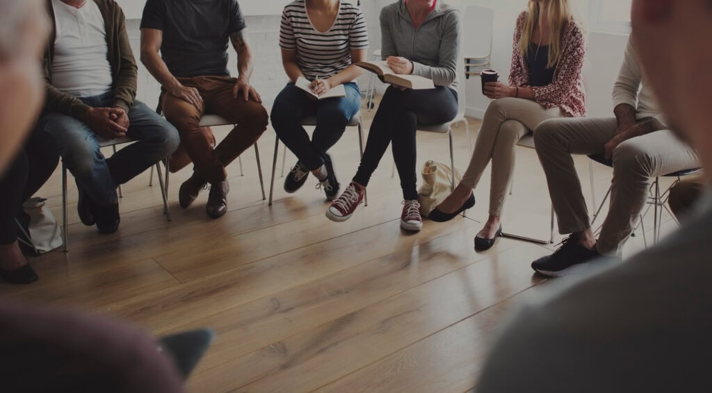 People sitting in a circle counseling where an IOP for fentanyl addiction provides structured support and stability during recovery.