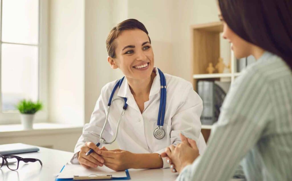 Physician meeting with a client during fentanyl addiction treatment in Massachusetts.