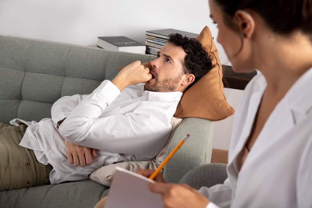 Young person talking with a specialist during trauma and substance abuse treatment in Massachusetts.