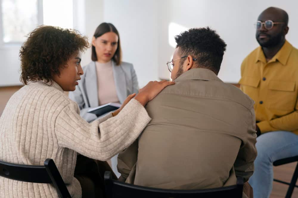 People sharing feelings during group therapy as part of first responder substance abuse treatment in Massachusetts at Brook Recovery Centers.