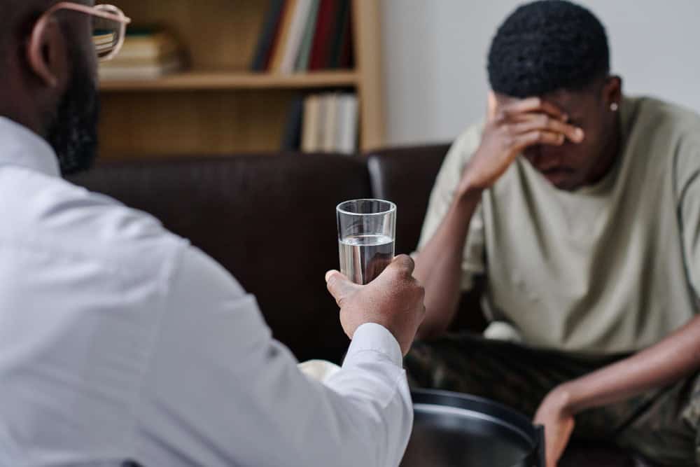 Man receiving support from a therapist during borderline personality disorder and addiction treatment in Massachusetts at Brook Recovery Centers.